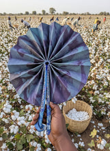 Load image into Gallery viewer, Blue and purple cotton tie-dye fan with a cotton harvest background