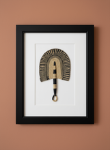 Load image into Gallery viewer, Framed decorative Ghanaian fan with a black frame on a brown background