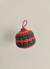 Load image into Gallery viewer, Colorful woven ball with a pink handle on a beige background