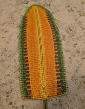 Carregar imagem no visualizador da galeria, Woven banana leaf with orange, yellow and green pattern on an earthen ground 
