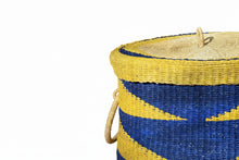 将图片加载到图库查看器，A handcrafted laundry basket made from dried elephant grass with a lime and indigo blue-colored triangular pattern
